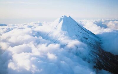 Why Do Clouds Often Form Above Mountain Peaks?