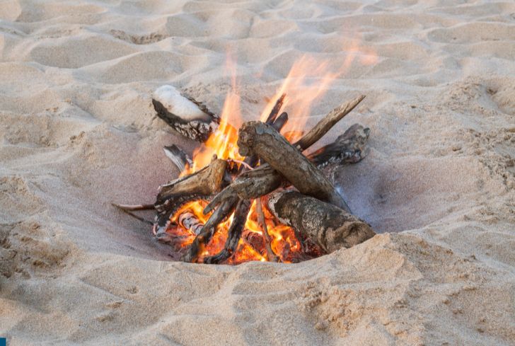 campfire-on-beach-sand